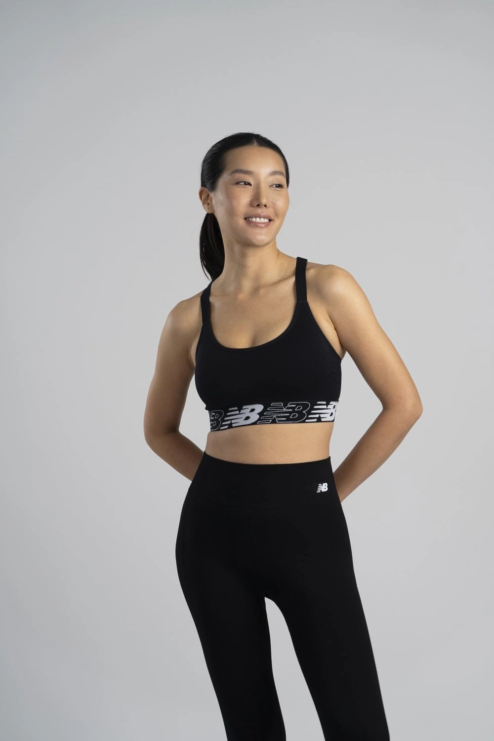 New Balance Women's Racerback Seamless Medium Support Sport Bra with Adjustable Straps and Removable Pads